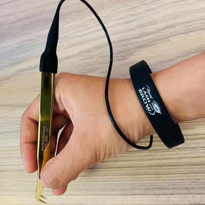 Handband To Protect Tweezers From Falling Out